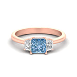 Load image into Gallery viewer, princess-cut-vivid-blue-trapezoid-engagement-ring-in-rose-gold-fdenr7981prgvbluesleep-nl-rg.jpg