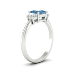Load image into Gallery viewer, princess-cut-vivid-blue-trapezoid-engagement-ring-in-white-gold-fdenr7981prgvblueangle2-nl-wg.jpg