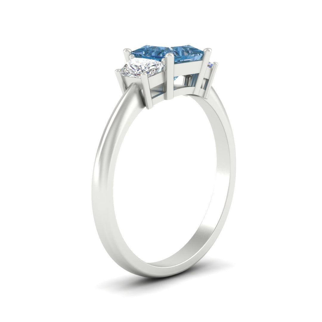 princess-cut-vivid-blue-trapezoid-engagement-ring-in-white-gold-fdenr7981prgvblueangle2-nl-wg.jpg
