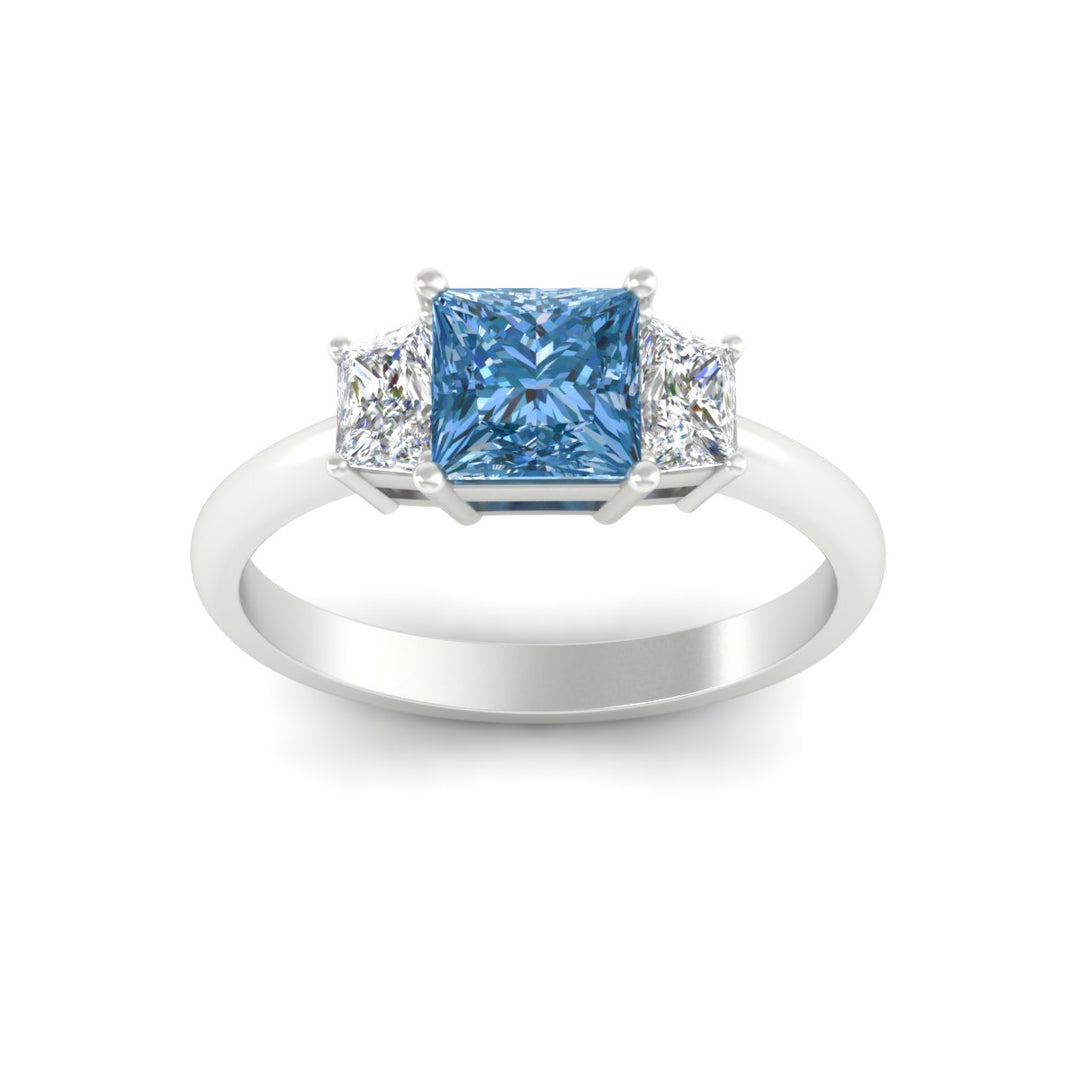 princess-cut-vivid-blue-trapezoid-engagement-ring-in-white-gold-fdenr7981prgvblueangle5-nl-wg.jpg