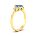 Load image into Gallery viewer, princess-cut-vivid-blue-trapezoid-engagement-ring-in-yellow-gold-fdenr7981prgvblueangle2-nl-yg.jpg