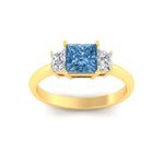 Load image into Gallery viewer, princess-cut-vivid-blue-trapezoid-engagement-ring-in-yellow-gold-fdenr7981prgvblueangle5-nl-yg.jpg