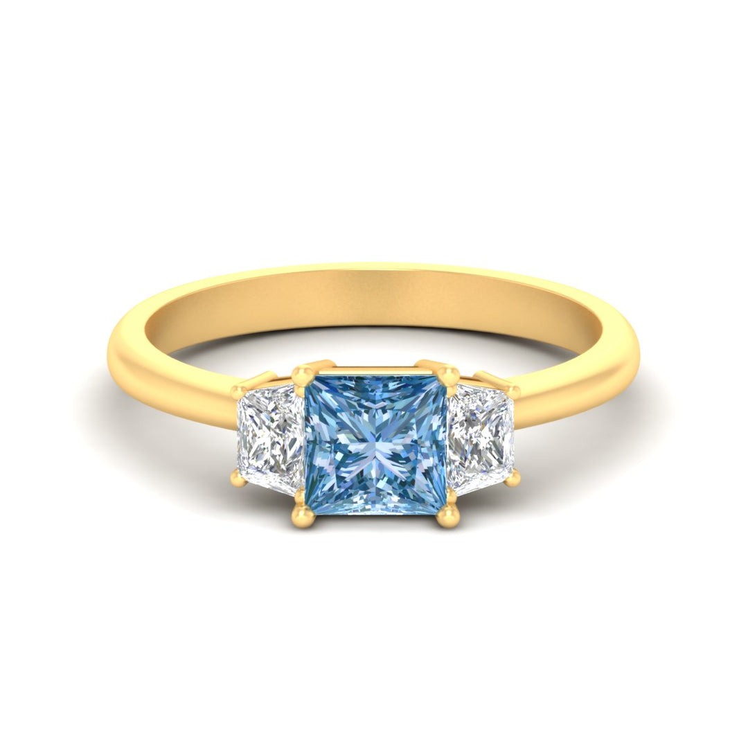 princess-cut-vivid-blue-trapezoid-engagement-ring-in-yellow-gold-fdenr7981prgvbluesleep-nl-yg.jpg