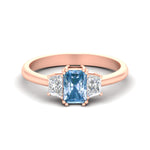 Load image into Gallery viewer, radiant-cut-vivid-blue-trapezoid-engagement-ring-in-rose-gold-fdenr7981ragvbluesleep-nl-rg.jpg