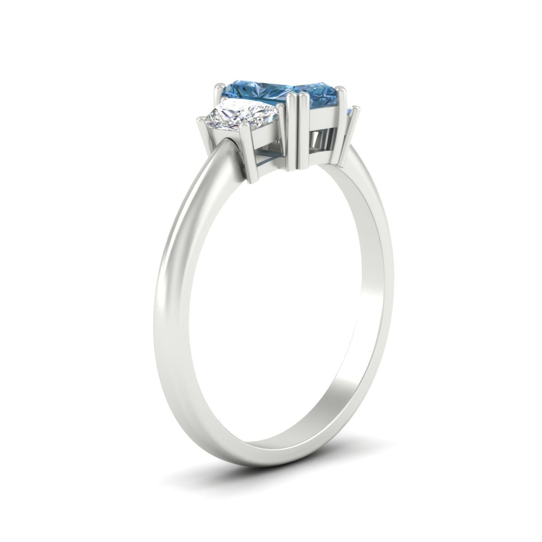 radiant-cut-vivid-blue-trapezoid-engagement-ring-in-white-gold-fdenr7981ragvblueangle2-nl-wg.jpg