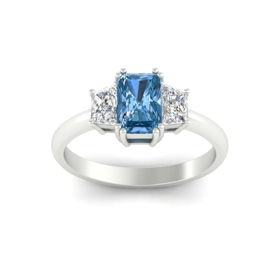 radiant-cut-vivid-blue-trapezoid-engagement-ring-in-white-gold-fdenr7981ragvblueangle5-nl-wg.jpg