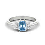 Load image into Gallery viewer, radiant-cut-vivid-blue-trapezoid-engagement-ring-in-white-gold-fdenr7981ragvbluesleep-nl-wg.jpg