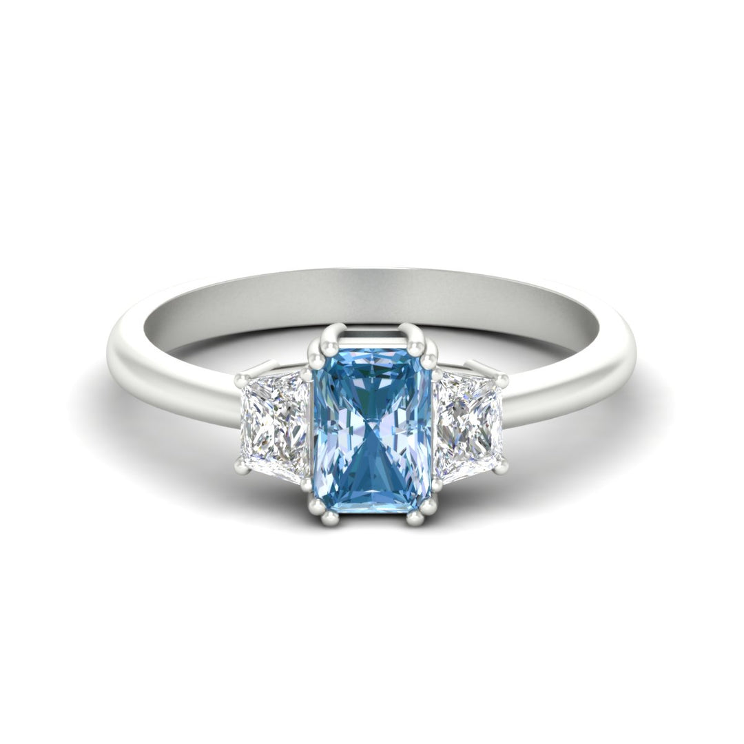 radiant-cut-vivid-blue-trapezoid-engagement-ring-in-white-gold-fdenr7981ragvbluesleep-nl-wg.jpg