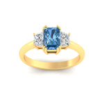 Load image into Gallery viewer, radiant-cut-vivid-blue-trapezoid-engagement-ring-in-yellow-gold-fdenr7981ragvblueangle5-nl-yg.jpg