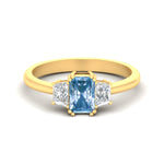 Load image into Gallery viewer, radiant-cut-vivid-blue-trapezoid-engagement-ring-in-yellow-gold-fdenr7981ragvbluesleep-nl-yg.jpg