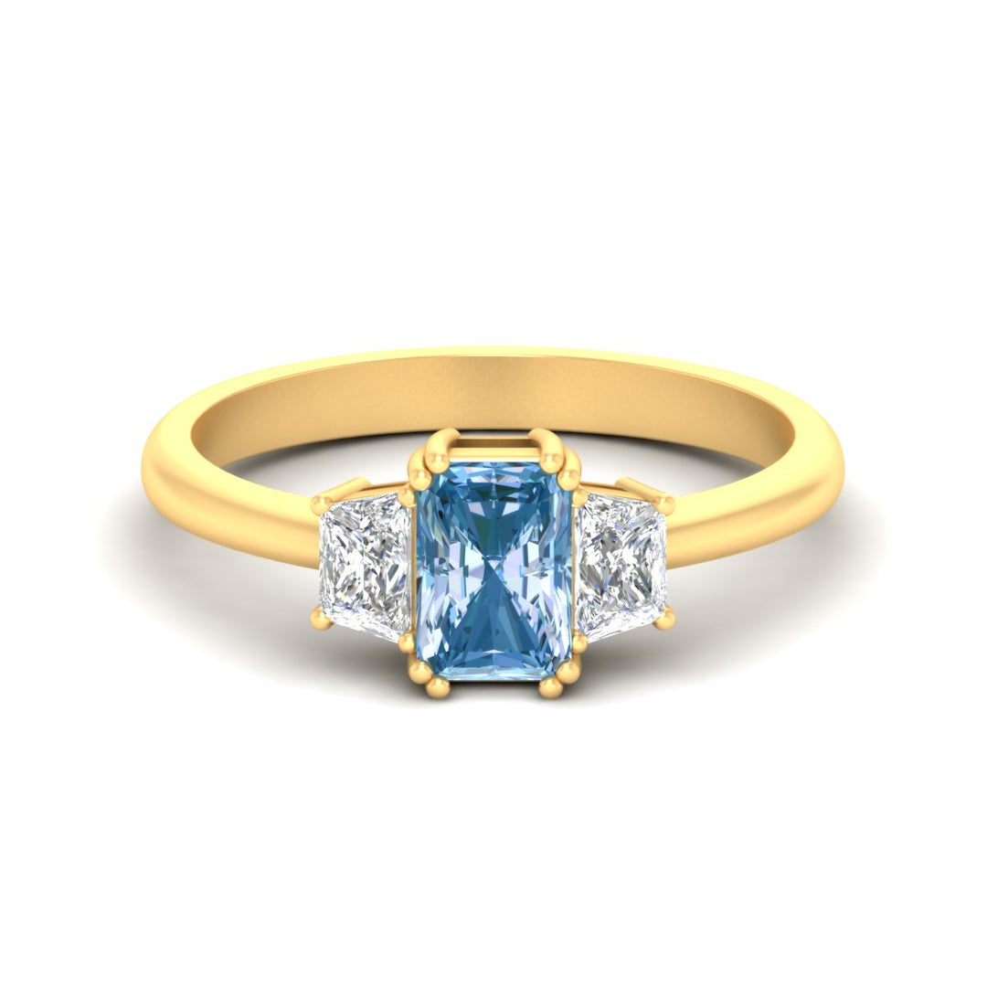 radiant-cut-vivid-blue-trapezoid-engagement-ring-in-yellow-gold-fdenr7981ragvbluesleep-nl-yg.jpg