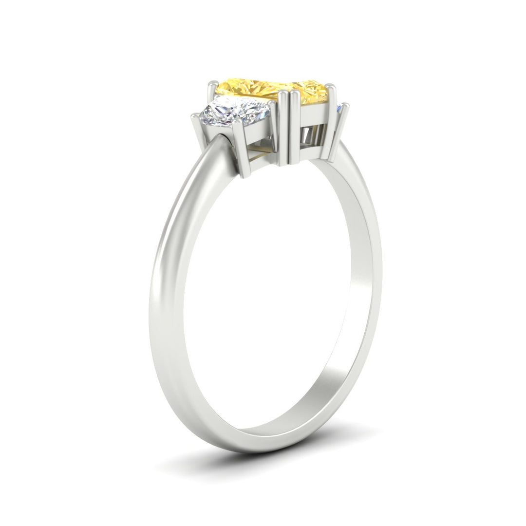 radiant-cut-vivid-yellow-trapezoid-engagement-ring-in-white-gold-fdenr7981ragvyellowangle2-nl-wg.jpg