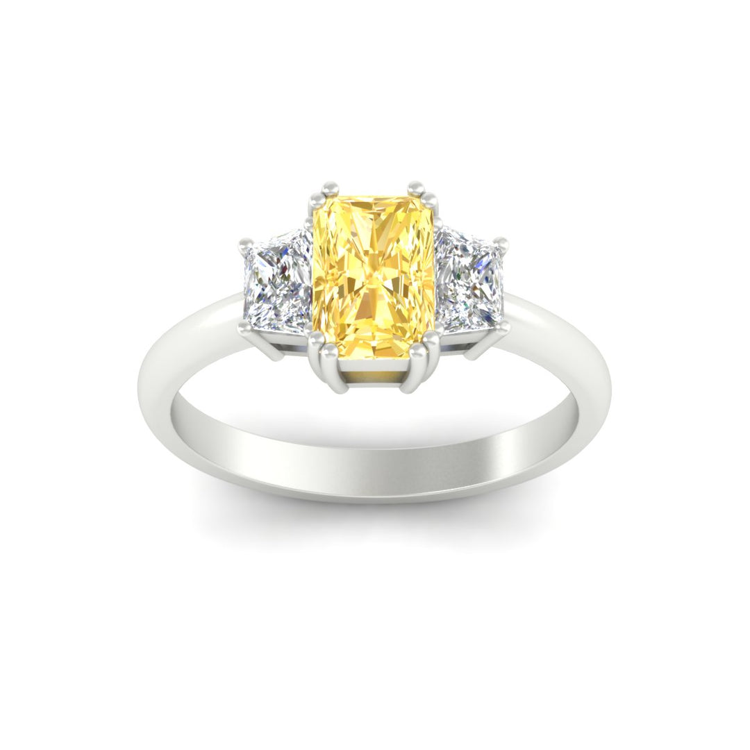 radiant-cut-vivid-yellow-trapezoid-engagement-ring-in-white-gold-fdenr7981ragvyellowangle5-nl-wg.jpg