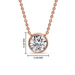 Load image into Gallery viewer, https://www.fascinatingdiamonds.com/cdn/shop/files/round-bezel-solitaire-diamond-4-carat-pendant-in-rose-gold-fdpd10538roangle1-4-00ct-nl-rg-hw_480x480.jpg?v=1772604708