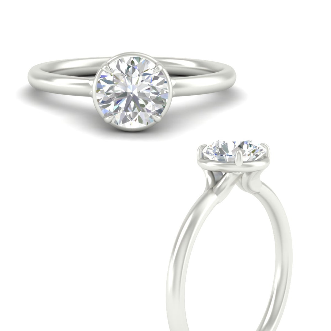 round-cut-collet-set-solitaire-diamond-engagement-ring-in-white-gold-fdenr11593roangle3-nl-wg.jpg