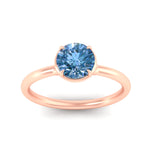 Load image into Gallery viewer, round-cut-collet-set-solitaire-vivid-blue-engagement-ring-in-rose-gold-fdenr11593rogvblueangle5-nl-rg.jpg