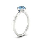 Load image into Gallery viewer, round-cut-collet-set-solitaire-vivid-blue-engagement-ring-in-white-gold-fdenr11593rogvblueangle2-nl-wg.jpg