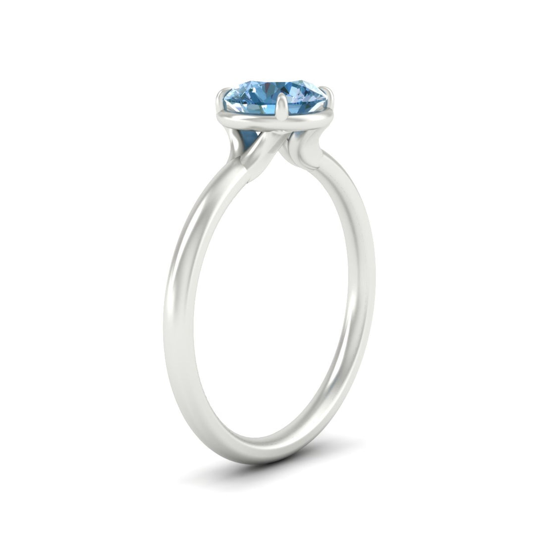 round-cut-collet-set-solitaire-vivid-blue-engagement-ring-in-white-gold-fdenr11593rogvblueangle2-nl-wg.jpg