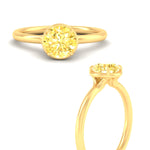 Load image into Gallery viewer, round-cut-collet-set-solitaire-vivid-yellow-engagement-ring-in-yellow-gold-fdenr11593rogvyellowangle3-nl-yg.jpg