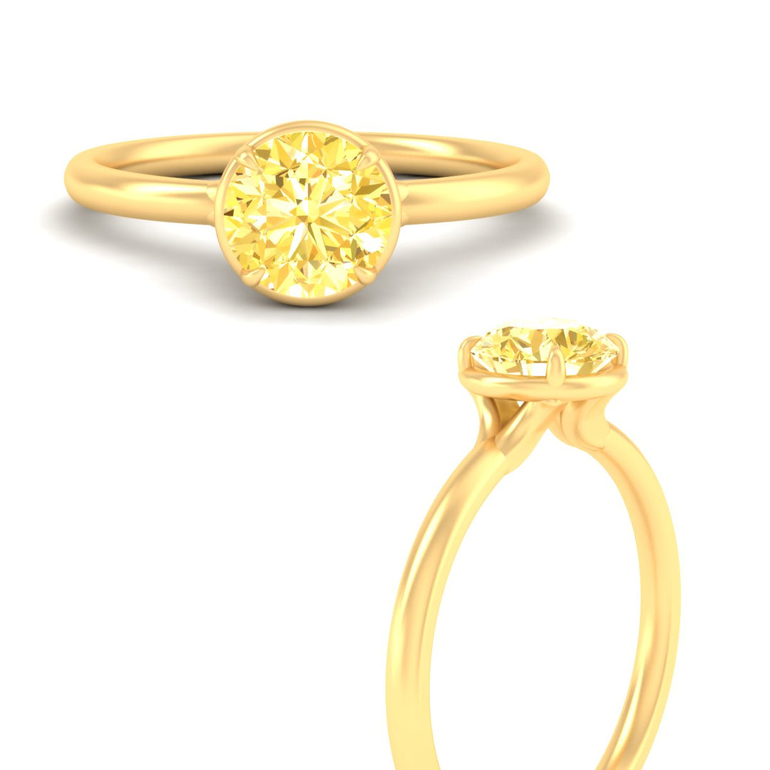 round-cut-collet-set-solitaire-vivid-yellow-engagement-ring-in-yellow-gold-fdenr11593rogvyellowangle3-nl-yg.jpg