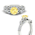 Load image into Gallery viewer, https://cdn.fascinatingdiamonds.com/fdens11635/round-cut-curved-vine-vivid-yellow-wedding-ring-set-in-white-gold-fdens11635gvyellowangle3-nl-wg.jpg