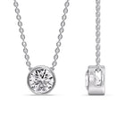Load image into Gallery viewer, https://www.fascinatingdiamonds.com/cdn/shop/files/sleek-bezel-set-2-carat-diamond-pendant-in-white-gold-fdpd10538_480x480.jpg?v=1768372910