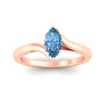 Load image into Gallery viewer, twisted-shank-marquise-cut-vivid-blue-solitaire-engagement-ring-in-rose-gold-fdenr1020mqgvblueangle5-nl-rg.jpg