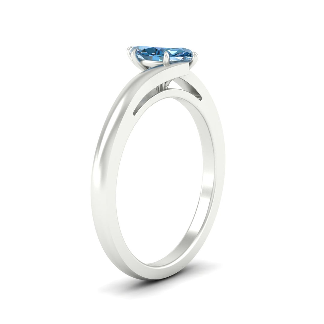 twisted-shank-marquise-cut-vivid-blue-solitaire-engagement-ring-in-white-gold-fdenr1020mqgvblueangle2-nl-wg.jpg