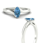 Load image into Gallery viewer, twisted-shank-marquise-cut-vivid-blue-solitaire-engagement-ring-in-white-gold-fdenr1020mqgvblueangle3-nl-wg.jpg