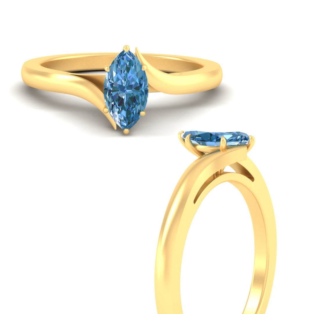 twisted-shank-marquise-cut-vivid-blue-solitaire-engagement-ring-in-yellow-gold-fdenr1020mqgvblueangle3-nl-yg.jpg
