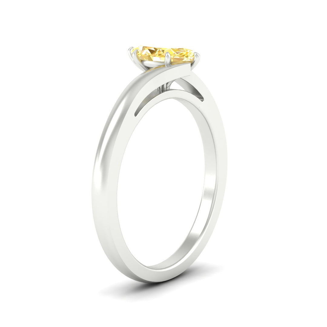 twisted-shank-marquise-cut-vivid-yellow-solitaire-engagement-ring-in-white-gold-fdenr1020mqgvyellowangle2-nl-wg.jpg