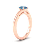 Load image into Gallery viewer, twisted-shank-pear-shaped-vivid-blue-solitaire-engagement-ring-in-rose-gold-fdenr1020pegvblueangle2-nl-rg.jpg