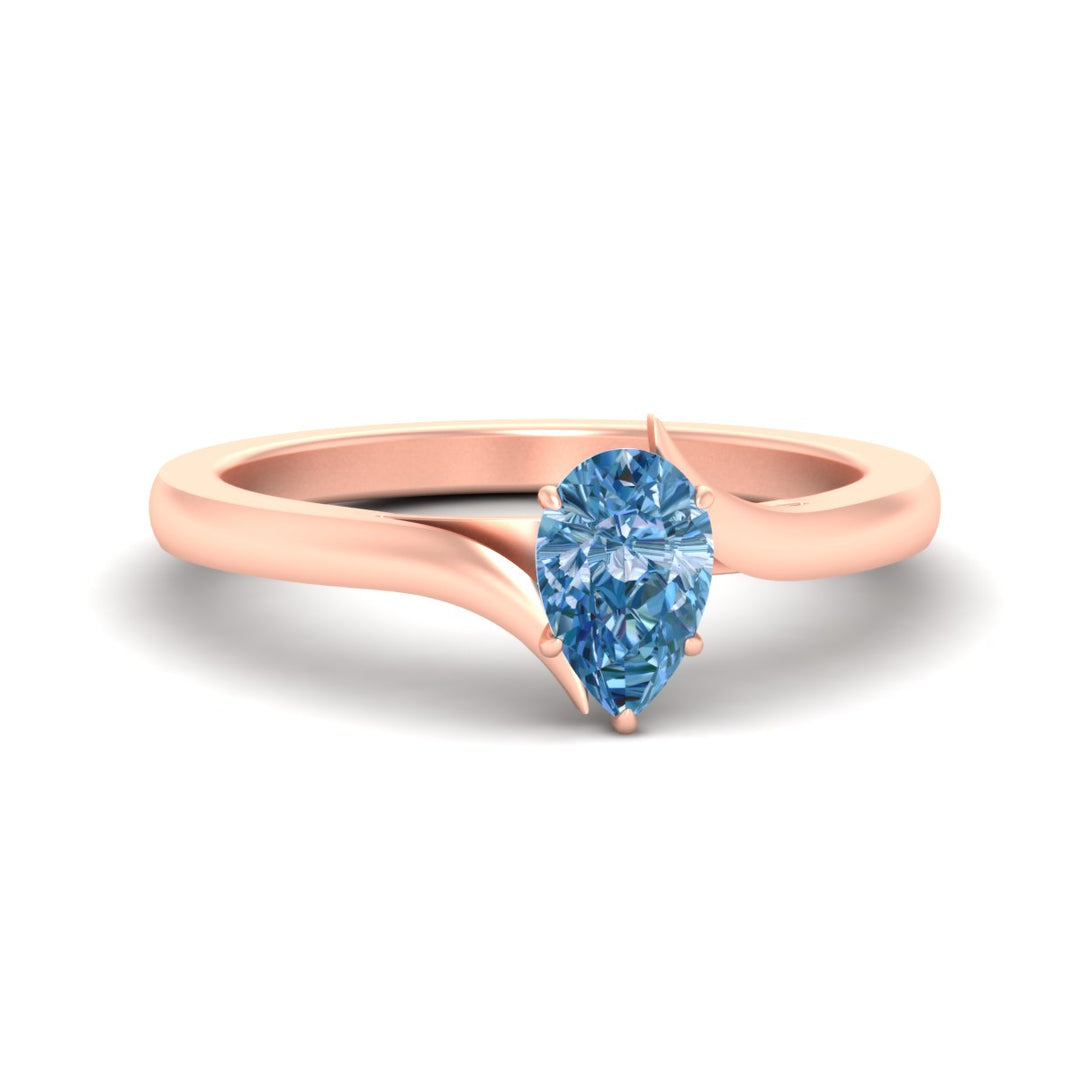 twisted-shank-pear-shaped-vivid-blue-solitaire-engagement-ring-in-rose-gold-fdenr1020pegvbluesleep-nl-rg.jpg