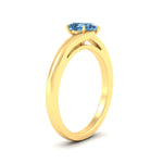 Load image into Gallery viewer, twisted-shank-pear-shaped-vivid-blue-solitaire-engagement-ring-in-yellow-gold-fdenr1020pegvblueangle2-nl-yg.jpg
