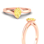 Load image into Gallery viewer, twisted-shank-pear-shaped-vivid-yellow-solitaire-engagement-ring-in-rose-gold-fdenr1020pegvyellowangle3-nl-rg.jpg