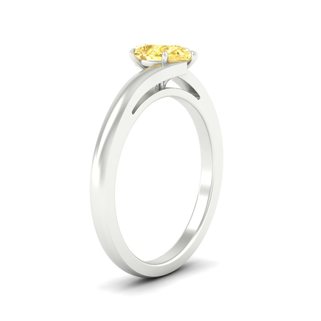 twisted-shank-pear-shaped-vivid-yellow-solitaire-engagement-ring-in-white-gold-fdenr1020pegvyellowangle2-nl-wg.jpg