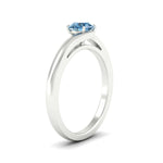 Load image into Gallery viewer, twisted-shank-round-cut-vivid-blue-solitaire-engagement-ring-in-white-gold-fdenr1020rogvblueangle2-nl-wg.jpg