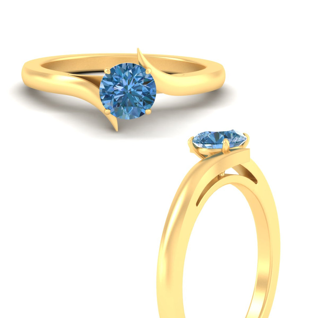 twisted-shank-round-cut-vivid-blue-solitaire-engagement-ring-in-yellow-gold-fdenr1020rogvblueangle3-nl-yg.jpg
